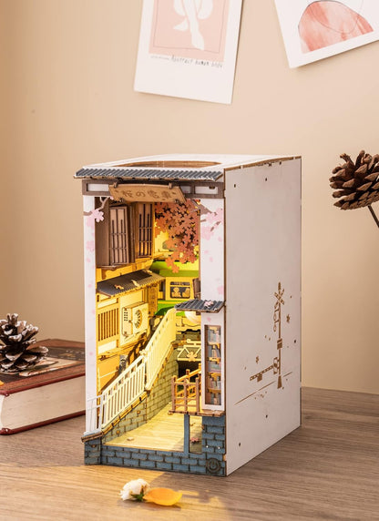 ROBOTIME DIY Book Nook Kit DIY Miniature Dollhouse Booknook Kit 3D Wooden Puzzle with LED Light,Decorative Bookend Bookshelf Insert Decor for Teens and Adults (Sakura Tram)